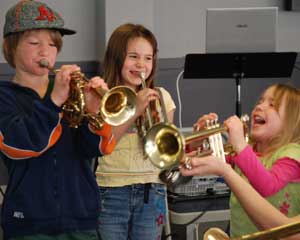 Laughing kids with horns