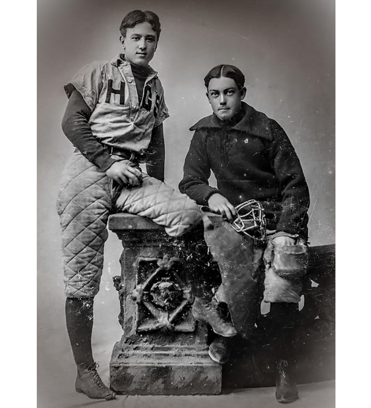 Charles Ives, left, captain of the baseball team and pitcher for Hopkins Grammar School, aged 18 (c. 1893)